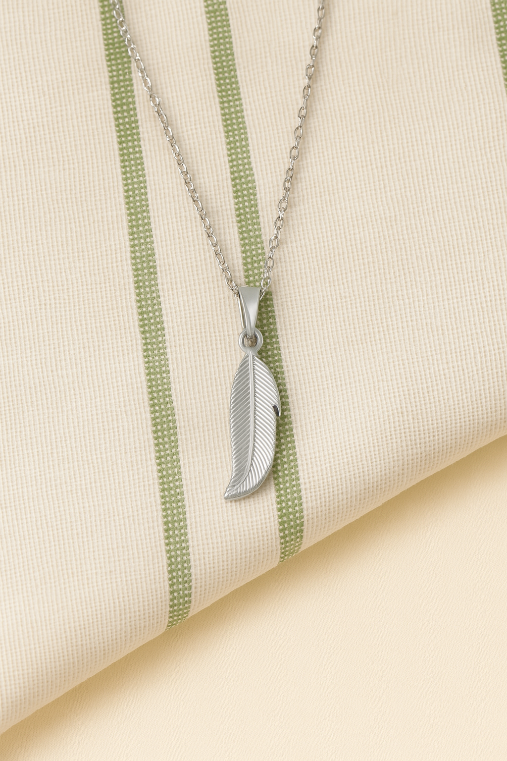 Feather pendant necklaces